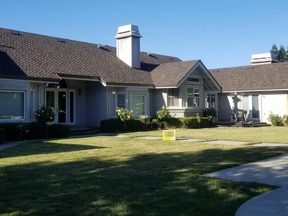 Completed shingle roof on a Livermore, CA ranch home by NuShake Roofing